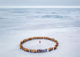 Visitors gathering around the geographical North Pole